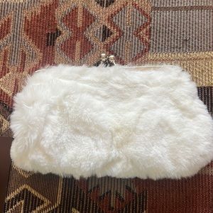 Faux fur clutch with in white fur with silver chain